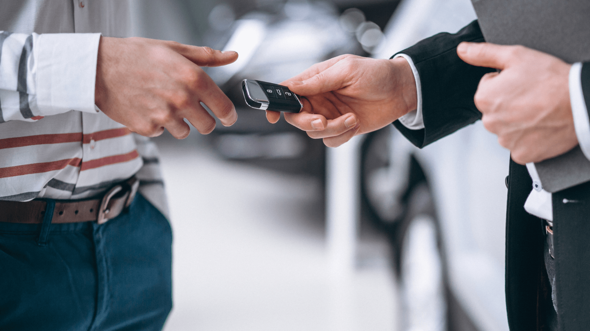 dealership handing over car keys